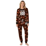 cincinnati-bengals-cuffed-pajamas-personalized-linear-icon-scatter-orange-best-selling.webp