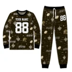 new-orleans-saints-cuffed-pajamas-custom-linear-icon-scatter-gold-best-selling.webp